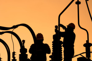 Workers seting up an electric sub station in Santiago de Chile