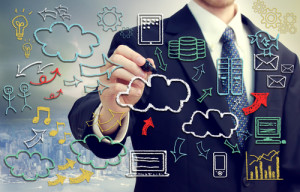 Businessman with cloud computing themed pictures
