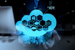 double exposure of hand showing Internet of things (IoT) word di