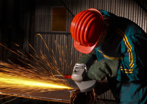 heavy industry manual worker with grinder 02