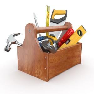 Toolbox with tools. Skrewdriver, hammer, handsaw and wrench