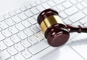Gavel at the computer keyboard